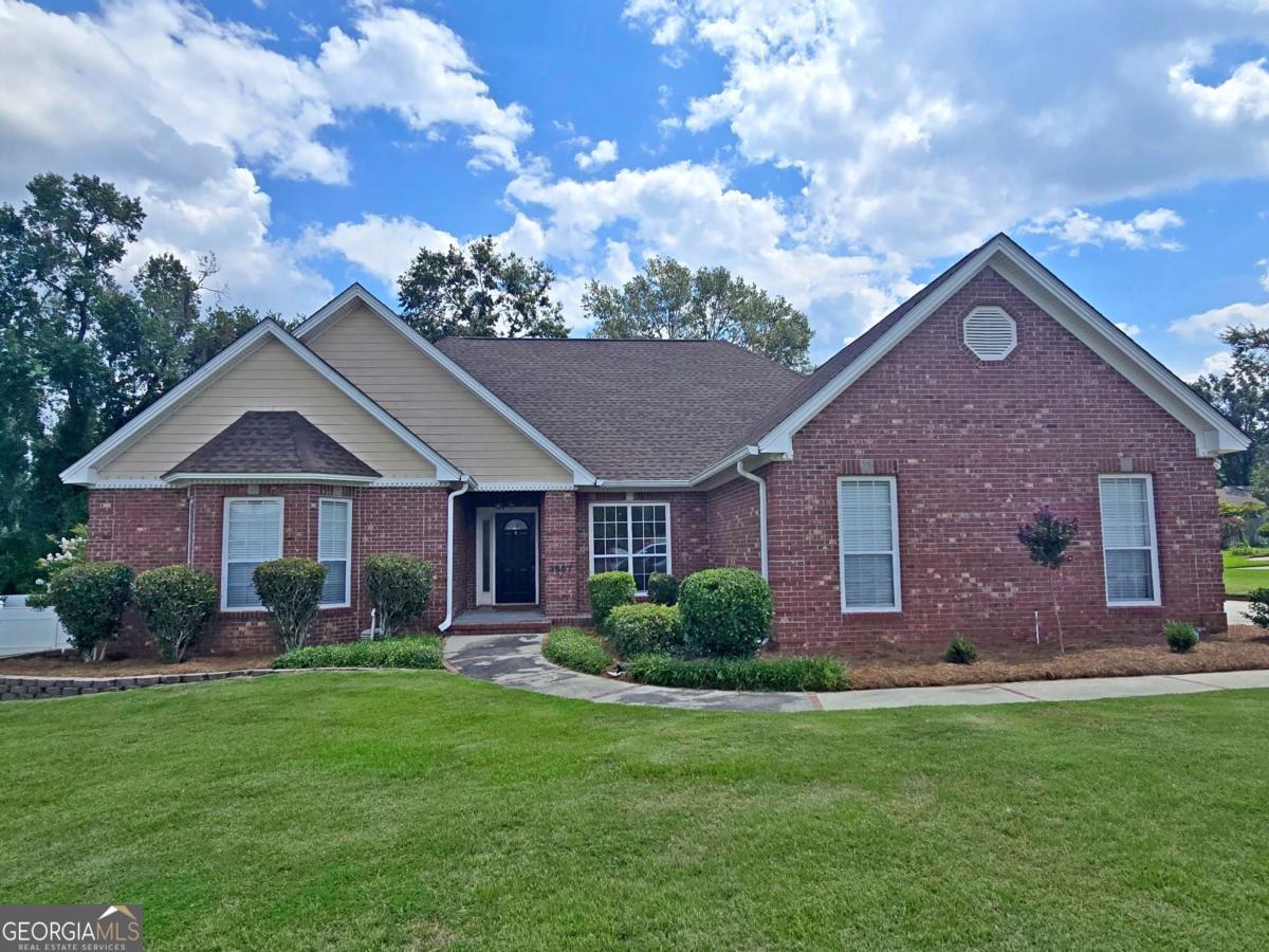 This 3BR/2BA, 2,020 sq ft brick home in the heart of Valdosta in beautiful Arbor Run subdivision is beautifully maintained and full of charm. Natural light fills the living spaces, highlighting the vaulted ceiling and cozy fireplace in the living room, which flows seamlessly into the formal dining area. The kitchen features granite countertops and ample cabinetry, perfect for everyday living and entertaining. The oversized master suite offers a double tray ceiling, a bay window reading nook, a large walk-in closet, and a spacious en-suite bath. A split floor plan provides privacy with two generously sized spare bedrooms and a full bath. Outside, enjoy a shaded fenced backyard ideal for kids, pets, or gatherings. With its central location, timeless design, and careful upkeep, this home is move-in ready and waiting for its next owner.