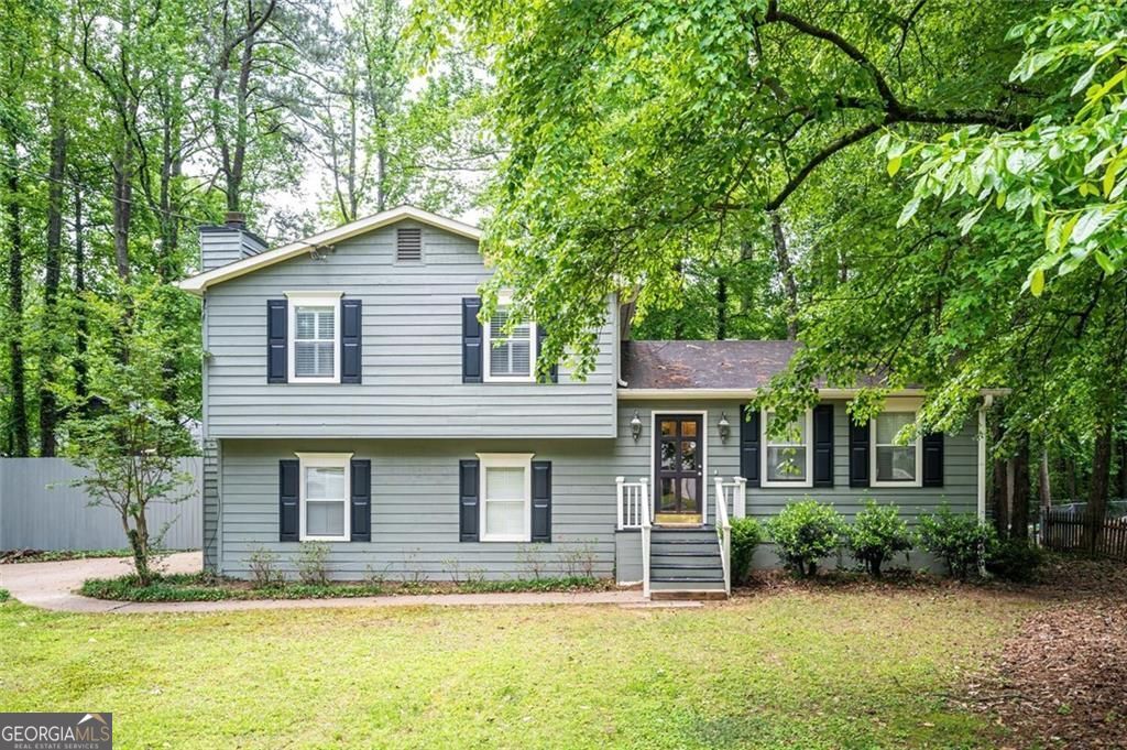 Calling all backyard lovers! This is the one for you. Well kept 3 bedroom 2 bath house in east Cobb. Fresh paint throughout the house, recently finished hardwood floors, and new carpet in the bedrooms give this beauty a fresh feel. The fully fenced backyard is a small paradise. Gigantic sun porch overlooks the deck and rest of the backyard. You'll truly feel at home here. Landscaping is included with the rent. Great east Cobb school districts, so don't waste any more time and schedule your appointment today!