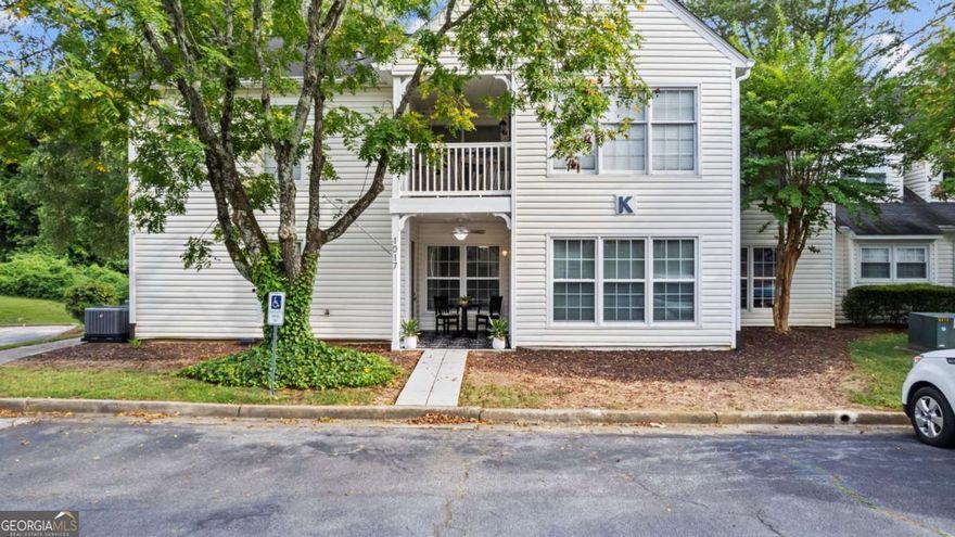 Freshly updated! Quiet, single-level, ground-floor, two-bedroom, two-bathroom condo.     NEW: Seamless LVP flooring, sleek stainless-steel appliances (stove, fridge, microwave, dishwasher), soft-close kitchen cabinets and drawers, garbage disposal, washer and dryer, HVAC, water heater, paint, and window treatments. A bright and airy sunroom invites you into an open and spacious living area.  Both bedrooms are generously sized with ample closet storage. This home is just minutes away from the fabulous Marietta Square. Within walking distance of beautiful Laurel Park, which features walking trails, pond, tennis and basketball courts, and playground. The community offers plenty of visitor parking, tree-lined streets, a sparkling pool with seasonal events, a serene gazebo, pond and stream, and ample, quiet greenspace. It feels worlds away, while being minutes from everything. The blend of inviting atmosphere and friendly neighborhood create a true sense of home, perfect for those seeking modern comfort in a prime location.