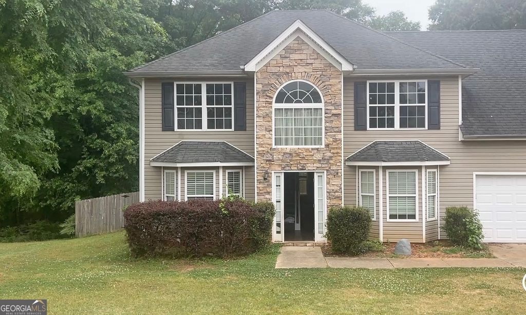 Photo of 386 Madison Avenue, Hampton, GA 30228 (MLS # 10741640)