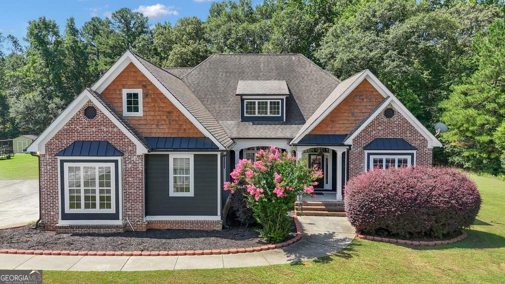 Photo of 660 Sandy Creek Road, Fayetteville, GA 30214 (MLS # 10826705)