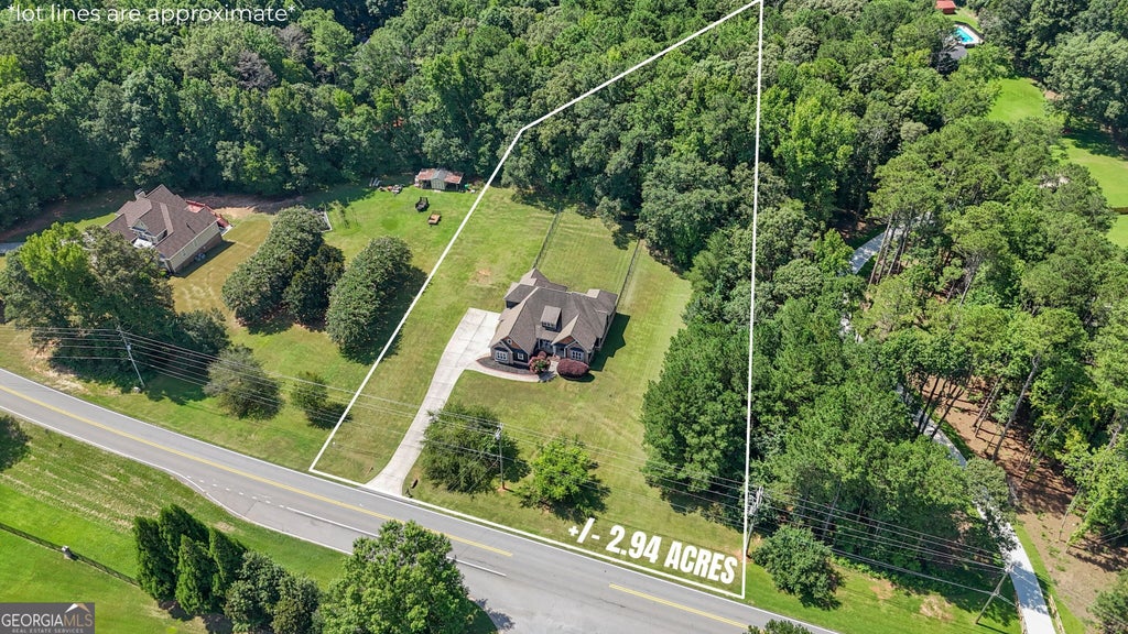 Photo of 660 Sandy Creek Road, Fayetteville, GA 30214 (MLS # 10826705)