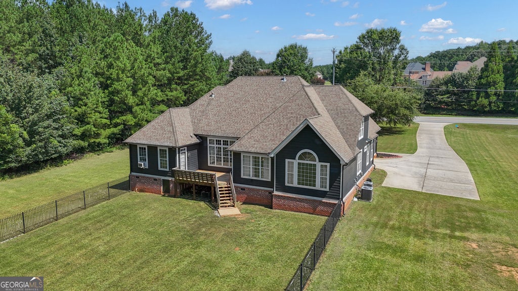Photo of 660 Sandy Creek Road, Fayetteville, GA 30214 (MLS # 10826705)