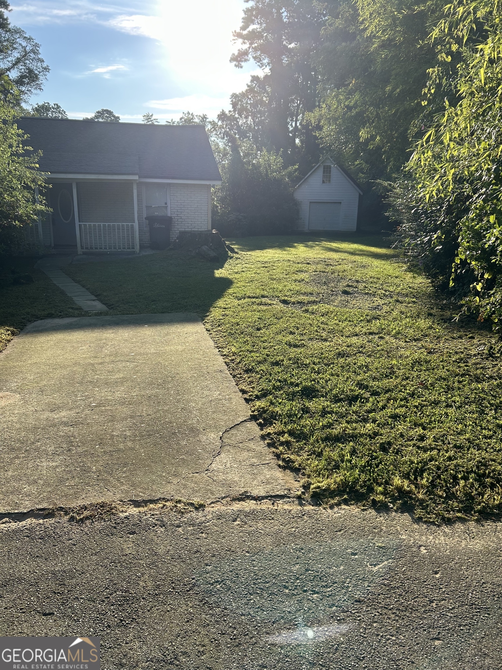 Investor Special or Perfect Starter Home - Rare Marietta Opportunity with No HOA! Don't miss this charming and move-in ready 2-bedroom bungalow in the heart of Allgood Manor, just minutes from Kennesaw State University and The Walker School! Whether you're a first-time homebuyer or a savvy investor, this property offers incredible potential. Situated on nearly 3/4 of an acre, the spacious lot provides room to expand, garden, or simply enjoy the extra privacy. A detached workshop/garage with a loft adds even more value - perfect for a home office, creative studio, guest suite, or additional storage. With no HOA restrictions, this is a rare find in Marietta - ideal as a primary residence, long-term rental, or Airbnb investment. Come see the possibilities today!