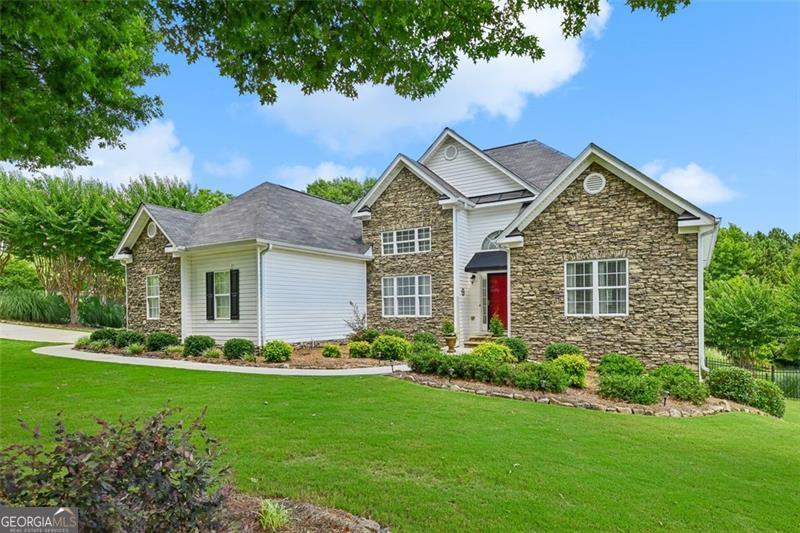 You will fall in love with all this home has to offer. Gorgeous curb appeal amongst the large 0.65 acre corner lot, professionally landscaped all around. Walk into the entry foyer and admire the open concept main living. High ceilings in the living room open up to the kitchen and separate dining room. The eat-in kitchen provides an abundance of counter and storage space. Stainless steel appliances, white cabinetry and granite countertops. The main level offers four bedrooms and two full baths. One could easily be used for an office. The primary suite has trey ceilings and a beautiful ensuite with separate soaking, jetted tub and glass enclosed walk-in shower. Dual vanities and large walk-in closet. Laundry is conveniently located on the main level next to the kitchen. Walk downstairs to the full finished basement. Enjoy movie night in the media room w projector screen. The game room with pool table and bar provide a great space for all friends and family to enjoy. Additional bedroom and full bath downstairs and an abundance of storage space. The backyard is an oasis you will not want to leave. The beautiful landscape surrounds a vinyl lined, in-ground saltwater pool. Large fenced in yard perfect for kids or the dog. Both the walk out deck and back patios offer great spaces for grilling and additional space for guests to enjoy.