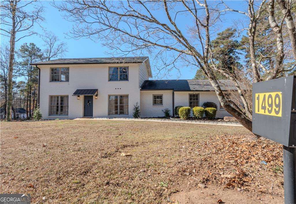 Photo of 1499 Smokehouse Ln, Stone Mountain, GA 30088 (MLS # 10660362)