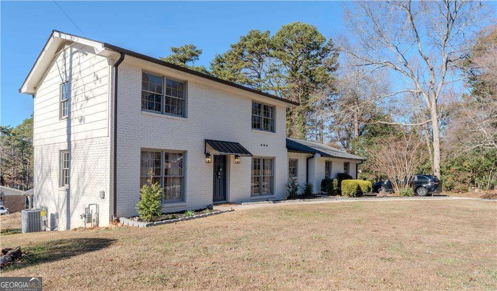 Photo of 1499 Smokehouse Ln, Stone Mountain, GA 30088 (MLS # 10660362)