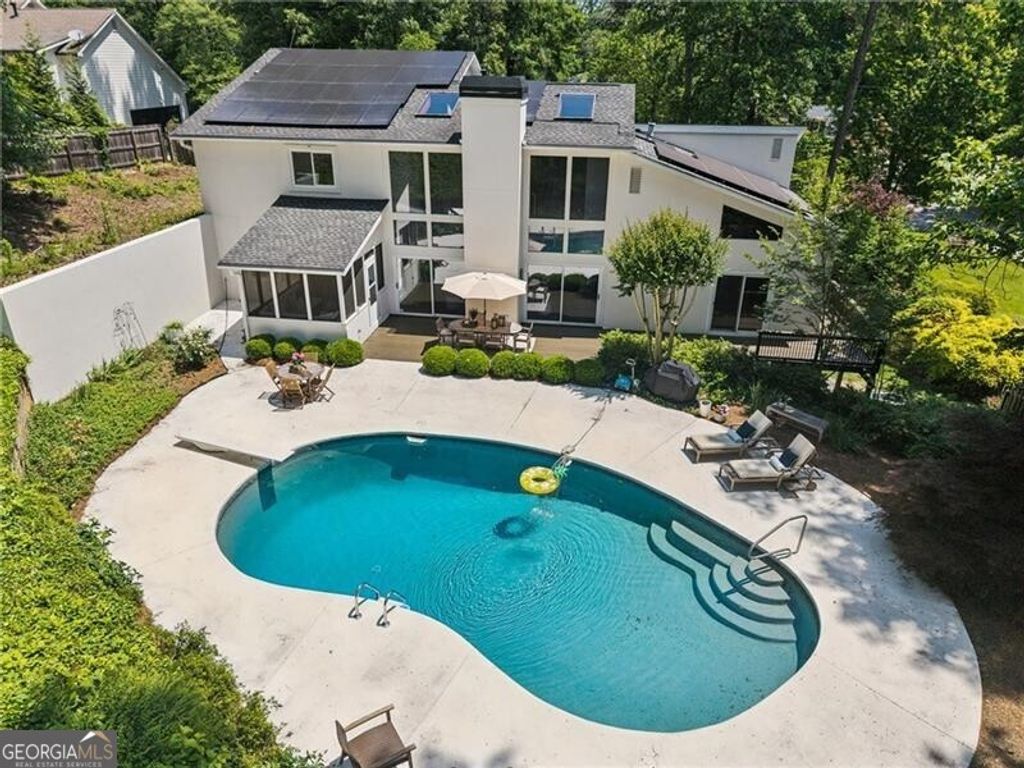 Photo of 950 Ivy Falls Drive, Atlanta, GA 30328 (MLS # 10765697)