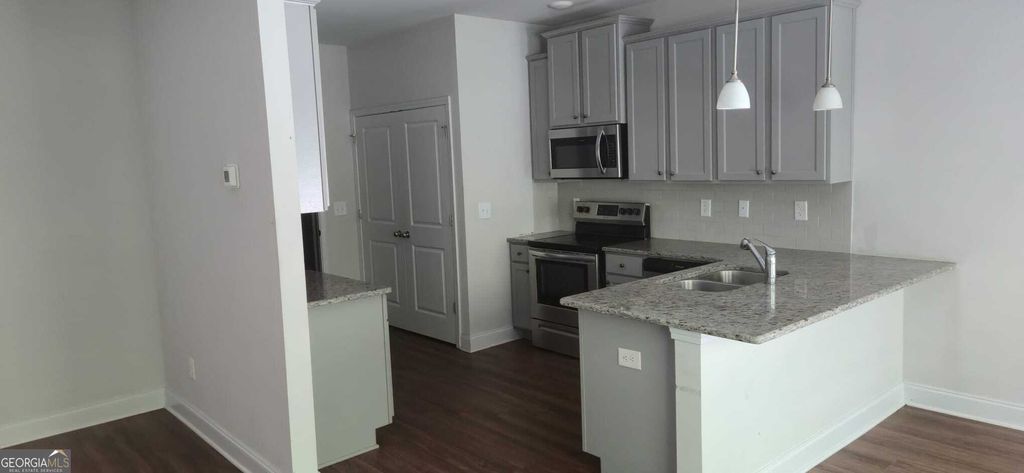 Photo of 10172 Benton Woods Dr, Covington, GA 30014 (MLS # 10800005)