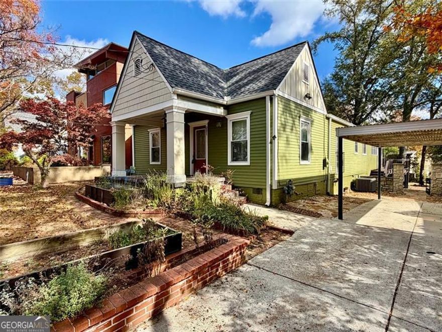 This Decatur classic tells a story, and it's ready for its next chapter! Built in 1932 and cared for with intention, this home blends timeless character with practical, everyday livability. Inside, sunlight fills the front living room, while the rear opens into a dramatic great room with vaulted ceilings, exposed beams, and a wall of windows overlooking the backyard. At the center, the kitchen anchors the home, complete with a Wolf range, pull-out spice rack, rolling prep tables, a large island, and stone counters that make both cooking and conversation effortless. Smart design shows up everywhere: a sunken open mudroom with custom coat and shoe cubbies, built-in shelving for storage or display, a bonus room perfect for an office or creative space, and a large laundry pantry with plenty of space and shelving. The primary suite brings a sense of retreat, featuring a walk-in closet with thoughtful organization, an open shower concept, a jetted tub for unwinding, and a heated towel rack for that extra touch of comfort. Every corner feels considered and ready to be lived in. Step outside and the story continues with a large raised deck overlooking a serene and shaded yard. It's peaceful when you need quiet, and open when you want company. When you do step out, you're less than a block from the Avondale MARTA station and just a few blocks more from the Publix shopping center for those quick runs to the store for forgotten ingredients on dinner night. This location makes daily life simple and connected. We've listened to the market, adjusted with intention, and priced with purpose. 221 Mountain View Street is ready to be seen with fresh eyes, and make its story part of yours.   There is also a partially finished, standing height crawl space with an impressive amount of room for storage and the potential for future development if you decide to take the home even further.
