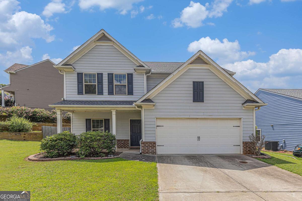 Welcome to this beautifully maintained 4-bedroom, 2.5-bath home nestled in a desirable subdivision just minutes from I-75-perfect for commuters! This charming property features gleaming hardwood floors and an updated kitchen complete with modern appliances, granite countertops, and ample cabinet space. Enjoy spacious living and dining areas, a cozy family room, and generously sized bedrooms. The primary suite offers a walk-in closet and en-suite bath. With great curb appeal, a private backyard, and access to excellent schools and amenities, this home has it all!