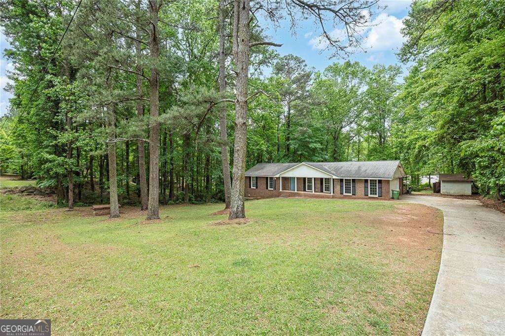 Photo of 3025 Robertswood Drive, Powder Springs, GA 30127 (MLS # 10757997)