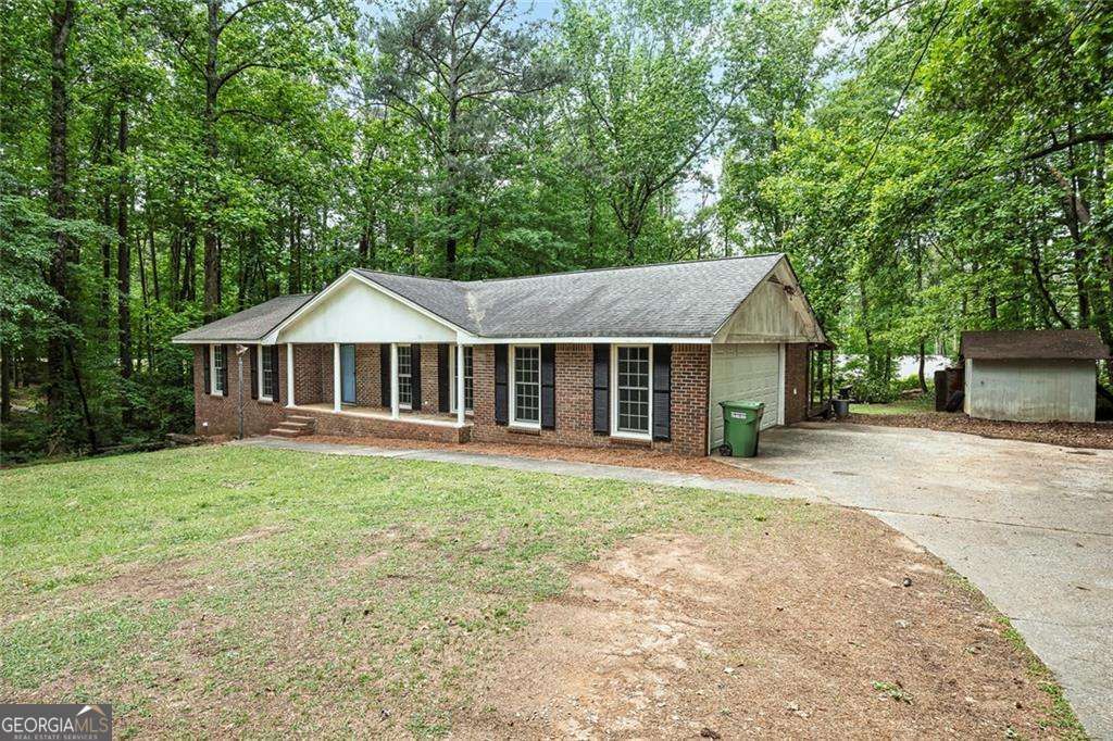 Photo of 3025 Robertswood Drive, Powder Springs, GA 30127 (MLS # 10757997)