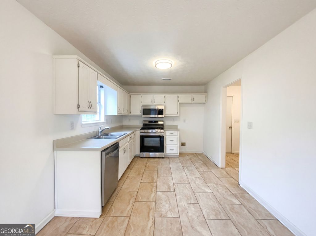 Photo of 10454 Iron Gate Lane, Jonesboro, GA 30238 (MLS # 10686998)