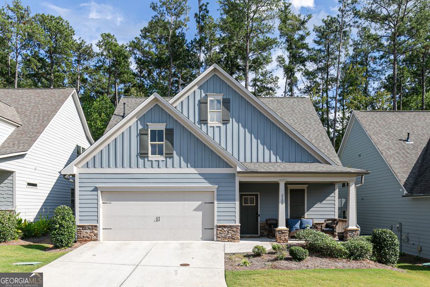 Welcome Home to 3100 Patriot Square, Marietta, GA 30064! This better-than-new ranch, built in 2019 and impeccably maintained, features 3 bedrooms and 3 full baths and is nestled within a gated 55+ active adult community. Offering thoughtful upgrades, elegant finishes, and a low-maintenance design, this exceptional home truly outshines new construction-perfectly tailored for today's active adult lifestyle seeking comfort, quality, and convenience. Welcome guests from the charming rocking-chair front porch, into the large inviting foyer where you'll immediately notice the gleaming hardwood floors, designer lighting, and open, airy layout-ideal for both relaxed living and effortless entertaining. At the heart of the home, the gourmet kitchen impresses with abundant soft-close white cabinetry, granite countertops, a stylish tile backsplash, stainless steel appliances, an oversized walk-in pantry, and a large island that opens to the dining area and spacious family room. The family room features hardwood flooring and a cozy stone fireplace-perfect for quiet evenings or hosting friends. Step outside to the covered back porch overlooking the beautifully landscaped, fenced backyard-a tranquil space to enjoy morning coffee or unwind at the end of the day. The owner's suite, conveniently located on the main level, offers a vaulted ceiling, ceiling fan, and a generous walk-in closet with custom built-ins. The spa-inspired ensuite bath showcases a large, fully tiled walk-in shower, dual vanities, and soft-close cabinetry-combining style and comfort. A secondary bedroom and full bath with tile flooring and marble countertops on the main level provide flexibility for guests, a home office, or a hobby room. Upstairs, you'll find a spacious third bedroom and full bath with tile flooring, soft-close cabinetry, and marble countertops-perfect for visiting family or friends. The second floor also boasts a large unfinished area, offering an abundance of storage or the potential to create a fourth bedroom, office, or flex space tailored to your needs. Additional highlights include a brand-new roof, energy-efficient systems, and meticulous care throughout. Located in a beautifully maintained 55+ gated community, residents enjoy a peaceful, friendly atmosphere with easy access to shopping, dining, medical facilities, Historic Marietta Square, and Kennesaw Mountain. This home seamlessly blends elegance, comfort, and convenience in one of Marietta's most desirable active-adult neighborhoods.