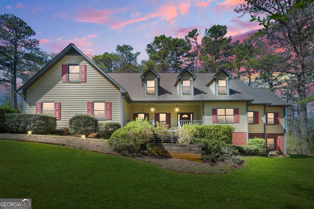 The home currently sits on approximately 3.04 acres. Additional acreage (totaling 5-6 acres) is open for discussion to the right buyer that would square off the lot and provide more road frontage if needed. This rare East Cobb property offers unmatched privacy and space, set well off the road with a long driveway and natural buffer from the street. Located in one of Marietta's most desirable areas, this home is just 15 minutes from Truist Park and The Battery, and within minutes of East Cobb Park, downtown Marietta, Vinings, Sandy Springs, Smyrna, and Brookhaven. This spacious residence features a desirable master-on-main floor plan with a large en suite bathroom and a massive walk-in closet. The updated kitchen includes stainless steel appliances, a walk-in pantry, and plenty of counter space-perfect for entertaining or daily family life. A full basement provides ample space for storage, hobbies, or potential expansion. The attached two-car garage adds convenience, while the surrounding acreage offers room for future development, recreation, or simply enjoying the privacy of your own retreat. Families will appreciate access to top-rated schools around the area. Surrounded by some of East Cobb's most prominent neighborhoods, this property blends privacy, space, and prime location-making it a true East Cobb opportunity that's hard to find.