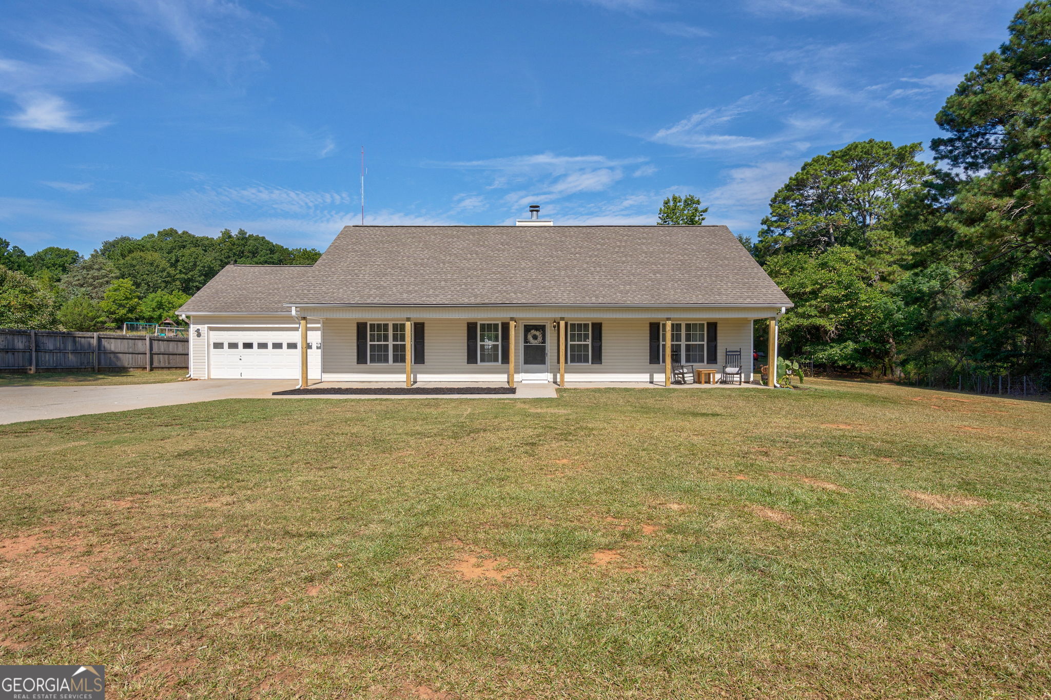 Welcome to your serene escape in beautiful Walton County! This beautifully maintained home sits on just over 2 spacious acres, offering the perfect blend of comfort, privacy, and country charm. Step inside to discover a well-designed split floor plan with thoughtful touches throughout. The inviting living room features vaulted ceilings, built-in shelving, and plenty of natural light - ideal for cozy evenings or entertaining guests. The quaint eat-in kitchen is full of charm and functionality, perfect for enjoying morning coffee with peaceful views of the sprawling backyard. Retreat to the private master suite, complete with elegant tray ceilings, a luxurious tile floor bathroom, dual vanities, and a large soaking tub - your own spa-like sanctuary at home. Additional highlights include a spacious laundry/mud room offering functionality and ample storage throughout. Outside, enjoy the freedom of open space with a chicken coop, outbuilding, and room to garden, play, or relax under the stars. If youre seeking peaceful living with the convenience of Monroe nearby, this property is a must-see!