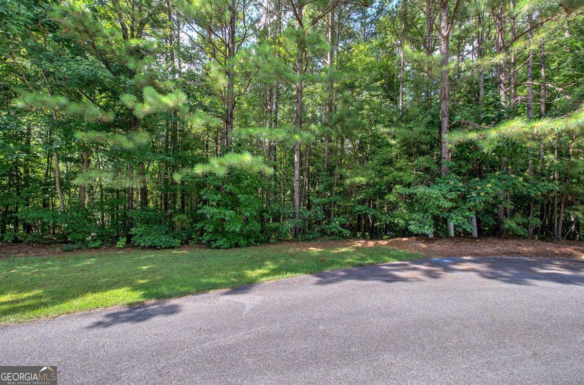 Welcome home to Forest Creek! This 2.7 tract is situated on a parcel of land that offers a rare combination of luxury, nature, and limitless potential. The level terrain is enveloped by mature trees, providing both natural beauty and a sense of serene seclusion-ideal for those seeking peace, privacy, and the perfect setting for your dream home. Whether you're imagining a sleek modern residence or a timeless estate, this property is a true blank canvas, ready to bring your vision to life. The generous lot size offers endless design possibilities, all within an established luxury community! Nestled on a cul-de-sac lot with plenty of privacy.