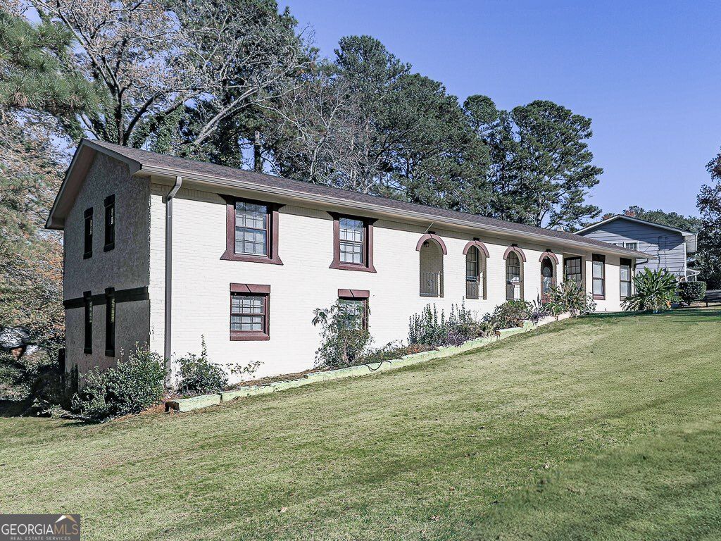 Photo of 6266 Auburn Drive, Riverdale, GA 30296 (MLS # 10648988)