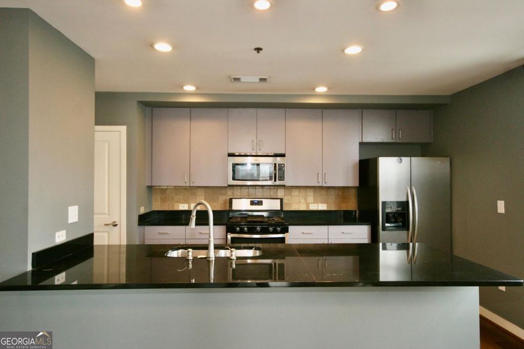 Photo of 565 Peachtree Street NE #1404, Atlanta, GA 30308 (MLS # 10666734)