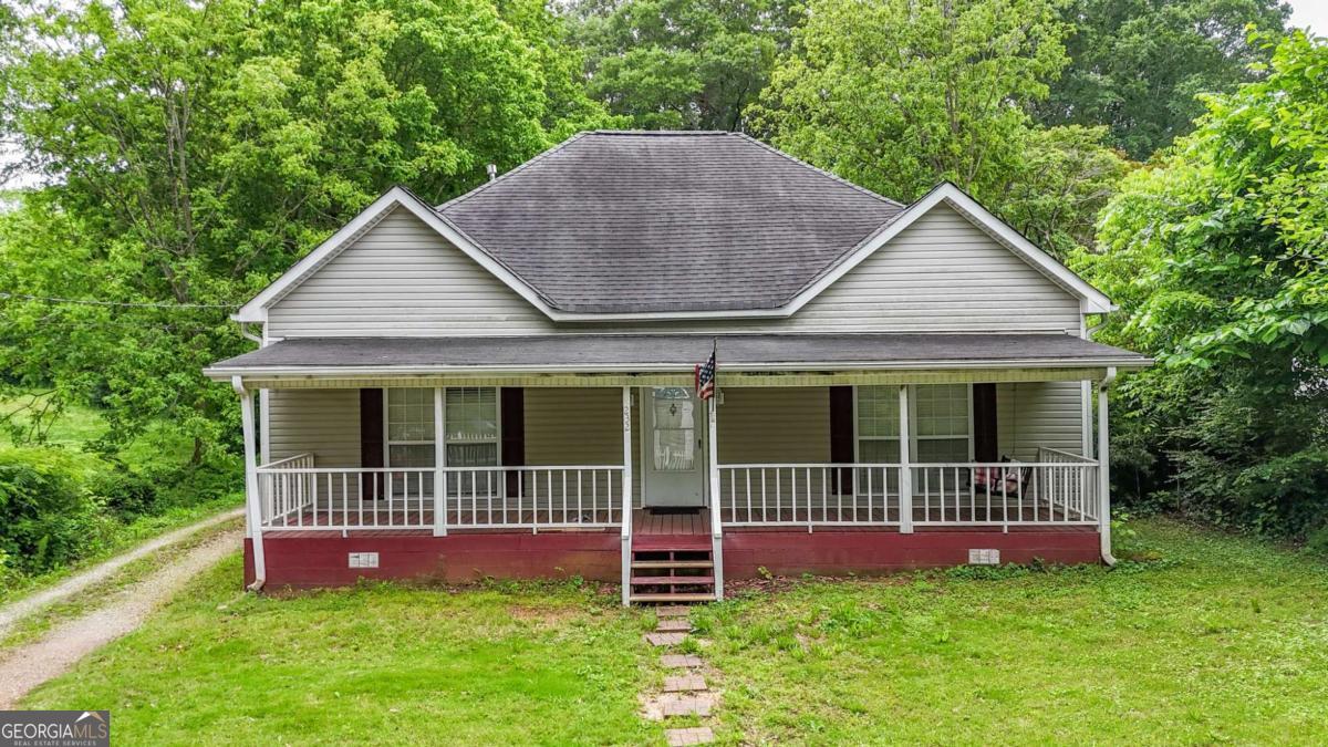 Attention All Investors! Turnkey Rental Opportunity in Downtown Villa Rica! Don't miss this incredible investment opportunity! This charming 3-bedroom, 1-bath historic home is located in the heart of quiet downtown Villa Rica - just a short distance to local restaurants, shops, and more. With a tenant already in place, this is a ready-to-go income-producing property from day one. The home features a spacious front porch, beautifully updated kitchen, decorative fireplace in the family/great room, and an outbuilding for extra storage or potential workspace. Whether you're adding to your portfolio or getting started, this property offers immediate returns and long-term value. Schedule your showing today - this one won't last!