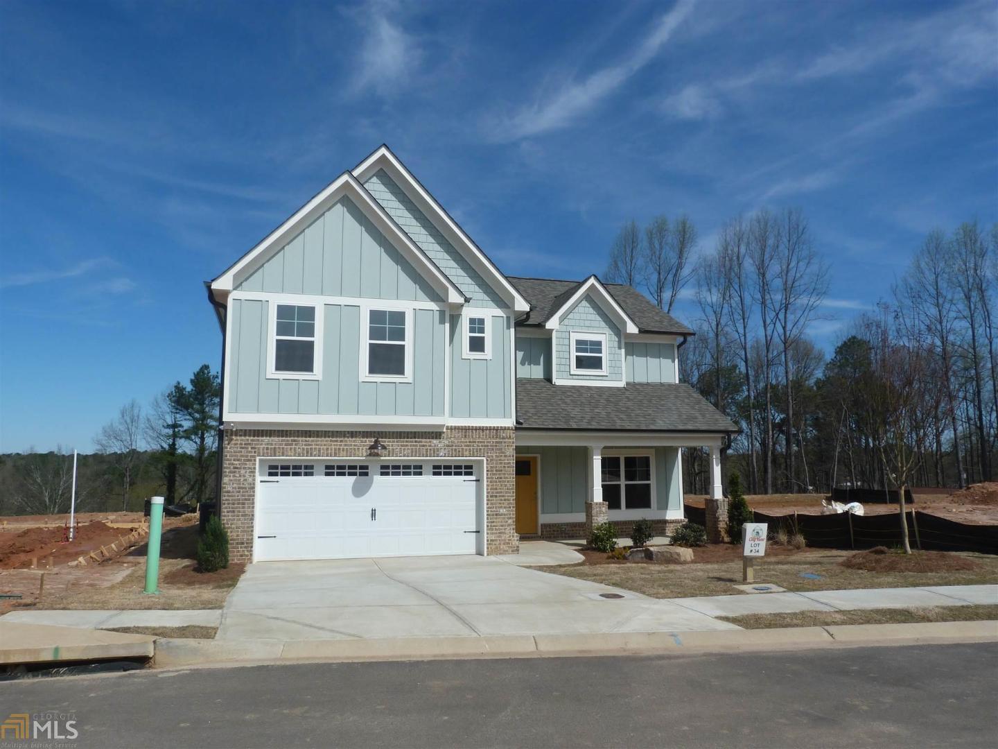 NEW HOME READY TO GO, In New Subdivision, City View! Conveniently & Centrally Located Within Walking Distance to Historic Downtown Lawrenceville! Featuring The Chestnut Plan! Open Floor Concept w/Spacious Great Rm w/vaulted ceiling & fireplace overlooking Kitchen. Includes: Wood floors on Main, Granite tops in Kit. & Baths, Cust. Shaker Cabs throughout, SS farmhouse sink & upgraded SS. Appl. Sep Dining Rm & Owner's Suite on Main w/ 2 walk-in closets & Spa Quality Bath. Make this unique community a place you enjoy & lifestyle where you can walk to everything & be within steps of your New Home! Builder offering $10,000.00 incentive with Our preferred lender! Open Daily from 1-5p