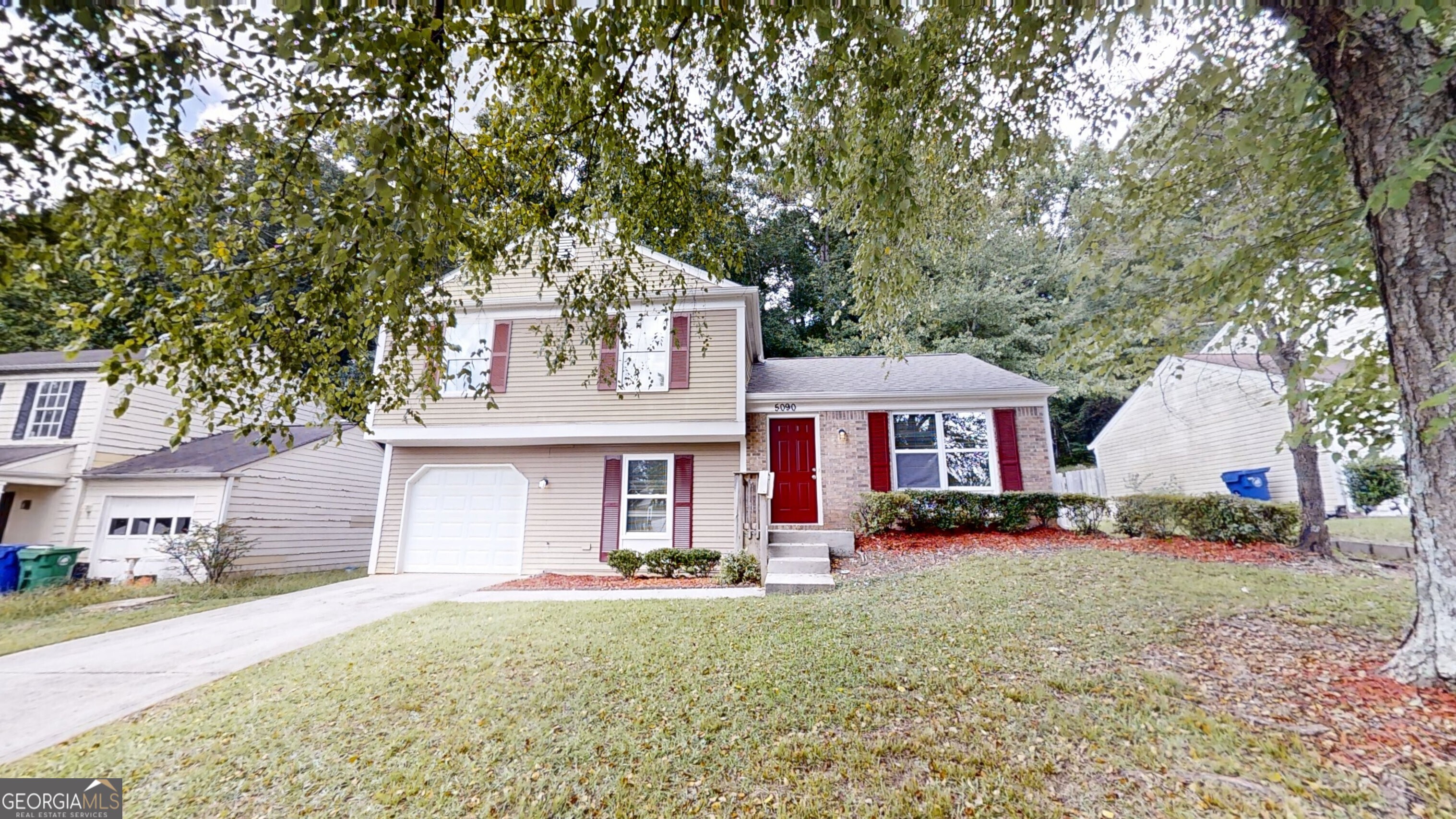 Welcome to this beautifully maintained 3-bedroom, 2-bath split-level home in the desirable Laurel Plantation neighborhood! Freshly painted throughout, this home features a mix of LVP, tile, and carpet flooring that adds comfort and style to every space. Enjoy a versatile layout with both a separate family room and a cozy den perfect for relaxing, entertaining, or setting up a home office. The family room includes a classic brick fireplace for added warmth and character. The kitchen offers white cabinets, granite countertops, and stainless steel appliances, making meal prep a breeze. The large primary bedroom includes an en-suite bath, providing a peaceful retreat at the end of the day. Step outside to a rear patio and enjoy a private backyard ideal for entertaining, gardening, or enjoying a quiet evening. Conveniently located with easy access to Hwy 78 and Hwy 285, and just minutes from shopping, dining, and schools this home combines comfort, space, and an unbeatable location. Don't miss your chance to make this move-in-ready gem your own!