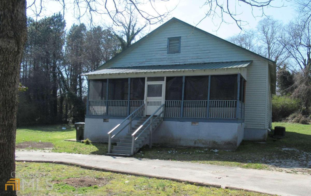 Large 5 bedroom home on huge lot with public utilities (sewer and water) near shopping, restaurants and interestate. Sold as is with no disclosures by corporate seller.