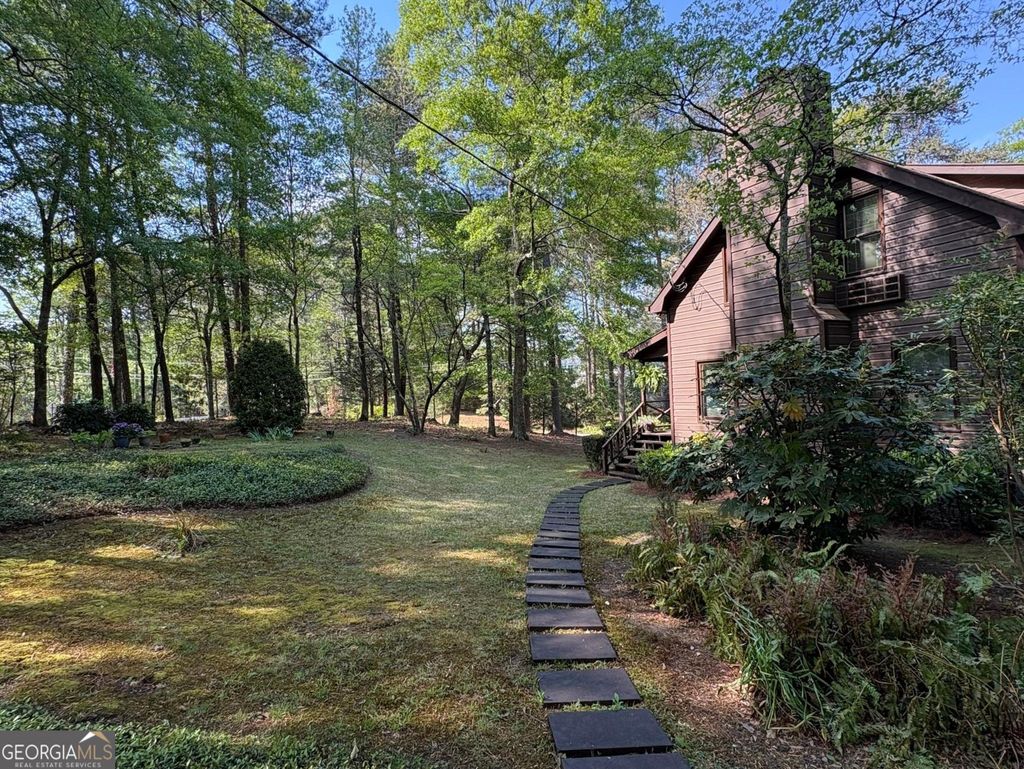 Photo of 3121 Bonds Lake Road NW, Conyers, GA 30012 (MLS # 10728144)