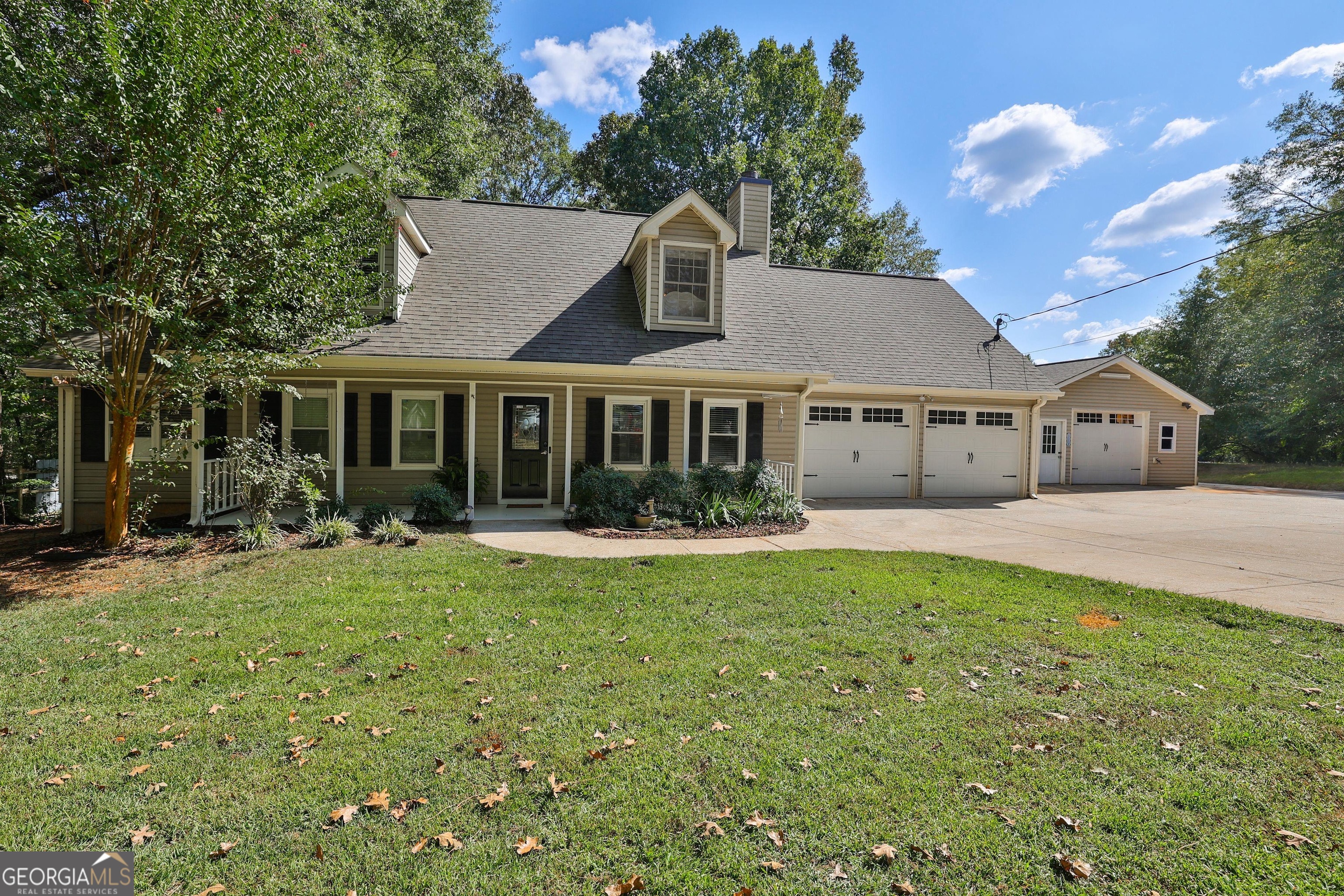 Bring your farming or homesteading dreams to life on 3 acres! This property comes with a detached garage, chicken coop for 15-20 hens, and water/power hookup for a camper. The home features a spacious master suite with barn doors, spa tub, and walk-in closet, plus a cozy family room with stone fireplace, granite kitchen, sunroom, and huge laundry/mudroom. Outside, enjoy a massive deck with firepit and gated yard. Upstairs offers 3 bedrooms, while a separate 1-bed/1-bath guest suite provides rental or farmhand space. Roof and well pump recently updated-ready for animals, gardens, or your next project!