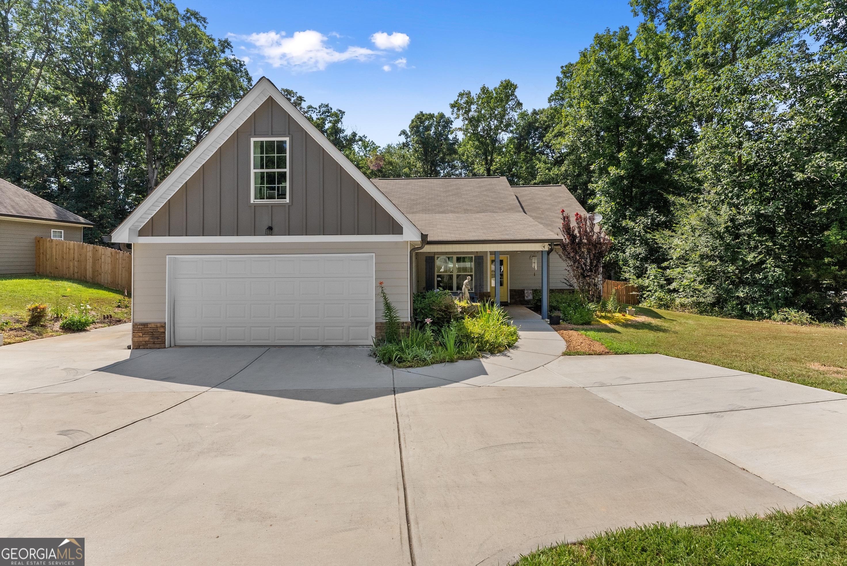 Built in 2020 and beautifully maintained, this 3-bedroom, 2-bath home blends modern convenience with natural charm in a quiet, established area. Ideally situated just minutes from Hwy 441 and a quick drive to Athens, it's a peaceful retreat with easy access to everything you need. Inside, you'll find a thoughtfully designed split-bedroom floor plan offering both space and privacy. The cozy living room features a fireplace that invites you to kick back and relax, while the spacious bonus room over the garage offers flexibility for a home office, playroom, workout space, guest retreat, or creative studio. The kitchen and breakfast area are light-filled and functional, with tall shaker cabinetry and warm granite countertops. Practical features include a two-car garage, extra parking pad for guests or additional vehicles, a covered from porch with a swing for relaxing and a rear patio overlooking the fenced back yard. The yard is generously sized with multiple areas perfect for a fire pit, hammock, or simply taking in the peaceful surroundings. The homeowner carved out a peaceful, natural area that's perfect for watching the birds or other native wildlife. With its excellent condition, charming layout, and outdoor personality, this home is ready for its next chapter. Come see it for yourself - your next home might just be waiting!