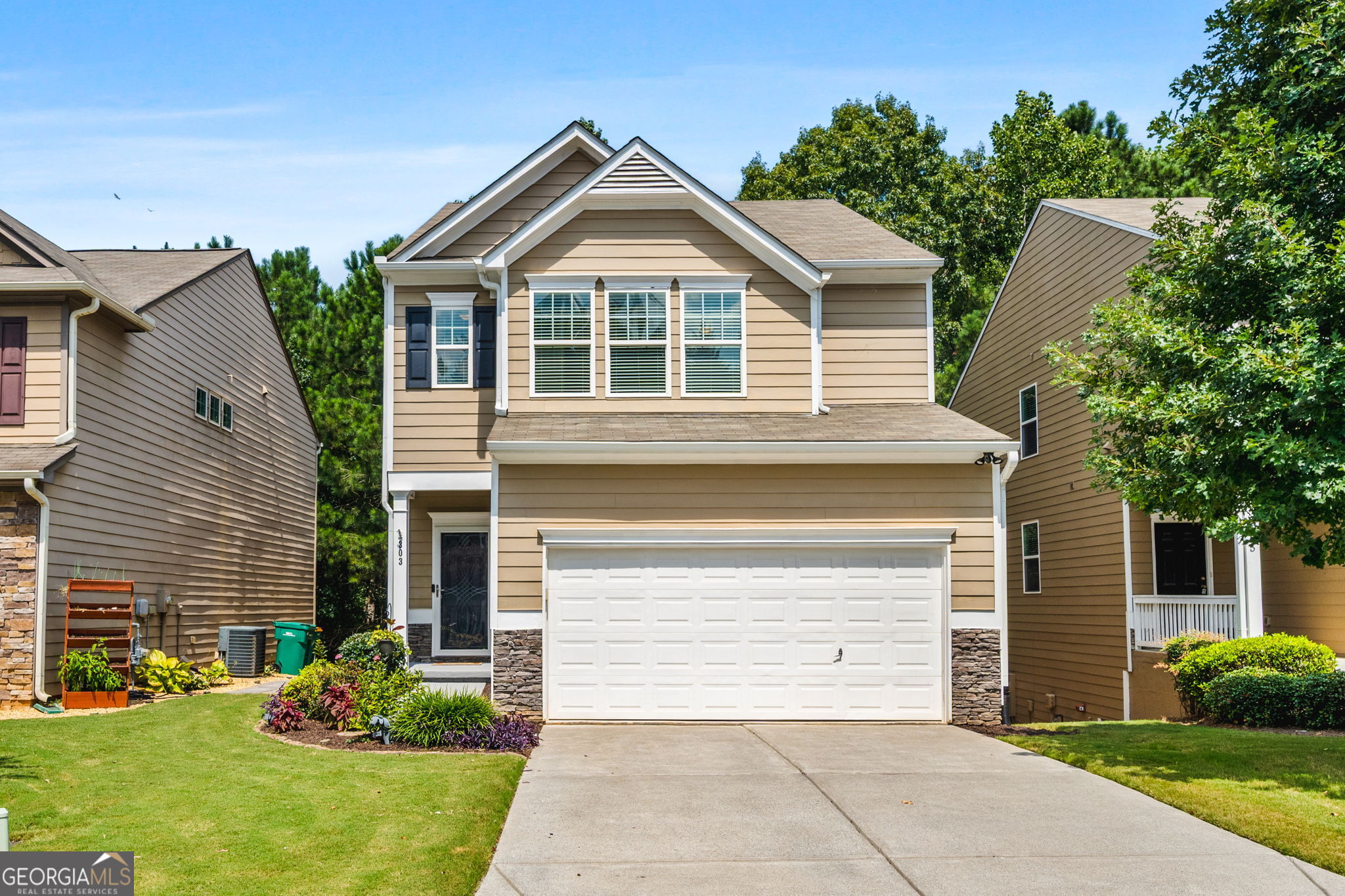 Your Woodstock Dream Home Is Calling - Are You Answering? Built in 2016, this move in ready, 3-bedroom, 2.5-bath gem is basically the "cool kid" of the neighborhood - stylish, full of personality, and ready to show off. Walk in and say hello to sun-soaked living spaces, scratch proof floors, and an open kitchen that practically begs for brunch with friends. The granite counters, timeless subway tile backsplash and stainless steel appliances are perfect for your inner chef - or your favorite takeout spread (no judgment!). Upstairs, the owner's suite is pure retreat mode with a spa-like bath where bubble baths are mandatory. Two more bedrooms give you space for guests, an office, or that Peloton you swore you'd use more often. And the unfinished basement? Think of it as a choose-your-own-adventure: game room, theater, gym, secret speakeasy - your call. It is conveniently plumbed for an additional bath already. Outside, there's a cozy back deck where you can sip coffee in the morning, grill out at night, and let the dog live its best life. Oh, and you're just minutes from downtown Woodstock's restaurants, breweries, concerts, and charm - so your weekends just got a serious upgrade. Townview Commons is the epitome of convenient locale, and the community offers a lovely pool and grounds maintenance! This one's got all the good vibes. We offer a complimentary pre-listing inspection so you don't have to waste time wondering if the home has been well loved and meticulously maintained. Don't wait - schedule your showing before someone else grabs it! Showings start Saturday at 10.