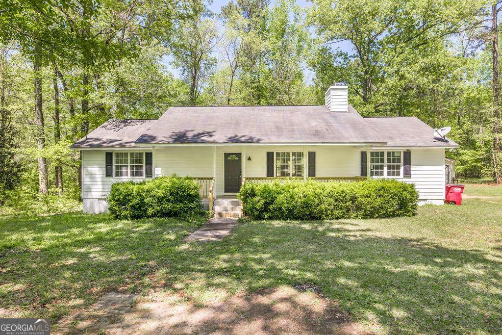 *New Roof Installed June 16 with transferable warranty. Enjoy your own slice of paradise in this newly remodeled home positioned on over 3 private acres. Just a few miles outside of Macon and yet you'll feel like you're at your own private retreat. The HVAC was just replaced and well repaired and serviced. The seller has fully renovated the kitchen and bathrooms, replaced flooring throughout the house, and re-built a large back deck to enjoy the peace and quiet. The primary suite includes a large soaking tub and double closets. This home is move in ready and it's waiting for you!