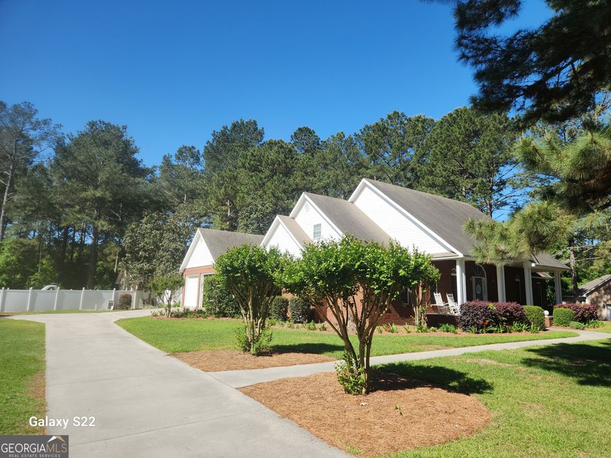 PRICE REDUCED! EXECUTIVE HOME IN TAYLOR RIDGE CUSTOM BUILT with 4 Bedrooms, 2 Bonus rooms for an Office, Playroom , or Extra Bedroom*** IN ADDITION A SEPARATE 800 SQUARE FOOT APARTMENT FOR FAMILY, POOL HOUSE, OR RENTAL.*** LARGE PRIMARY SUITE WITH DOUBLE GRANITE VANITIES, JETTED TUB, SHOWER, AND 2 WALK IN CLOSETS***2 Additional Bedrooms on the main level along with an office or Playroom*** Upstairs find a Large  Bedroom and Bath, Plus another Bonus Game Room and Attic Storage. GREAT OPEN FLOOR PLAN featuring  Kitchen Granite Counters with Custom Cabinetry, All Appliances overlooking  a Breakfast Bar and Everyday Dining Area***A 30 x 40 GREAT ROOM, DINING ROOM , AND FOYER make for a great Family Gathering*** OUTSIDE FIND A COVERED PATIO FOR GRILLING AND RELAXING*** Completely Private Back Yard with A KIDNEY SHAPED POOL featuring a slide and Diving Board all enclosed with a 6 foot Vinyl Privacy Fence*** Great neighborhood for walking, golf carts and more. YOUR LIFE*YOUR HOME*LOVE IT!!