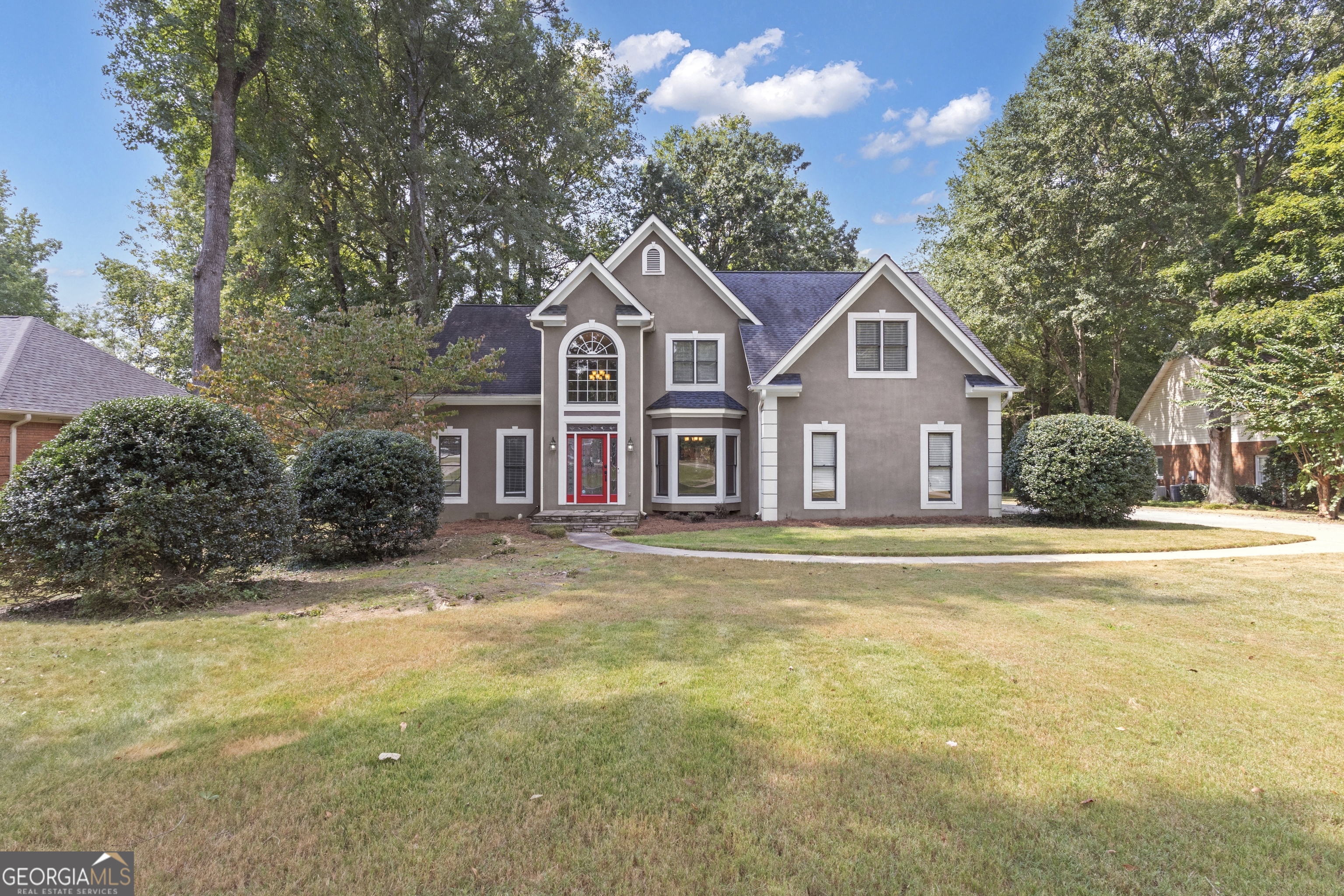 Tucked away near the end of a quiet cul-de-sac, this home offers plenty of space for family and friends along with beautiful views of the Seminole Course's 5th hole. The main level features hardwood floors and an open layout that makes gathering easy. The kitchen is designed for everyday living, complete with a large island, granite countertops, walk-in pantry, and stainless-steel appliances. A sunny flex space off the living room and a spacious deck are perfect for enjoying the golf course view. On the main floor you will find the primary suite with a thoughtfully renovated bathroom, giving you a relaxing retreat with a fresh, modern bathroom, double sinks, walk-in closet, and oversized shower and soaking tub. Upstairs, three bedrooms and two full bathrooms provide plenty of room to spread out, plus an oversized laundry room that makes chores a little easier. Located in White Oak, you'll love being close to schools, shopping, restaurants, and easy I-85 access-all while enjoying the quiet setting of this established neighborhood. This home has been recently rezoned for Northgate High School.