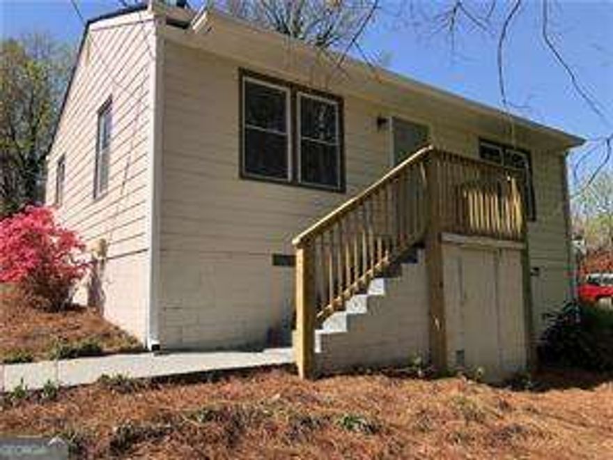 Perfect investment property or starter home just minutes from Historic Marietta Square. Great location and in close proximity to restaurants and stores. Home has been renovated with New Roof, Gutters, Windows, Plumbing, new  1000 gal Septic tank, LVP flooring throughout. Enjoy the fresh appeal of an upgraded bathroom. All home interior and exterior has been painted,renovated and has  stainless steel kitchen appliances and granite countertops,  This gem is move-in ready. There are no HOA or rental restrictions. Schedule your showing today!Special financing available.