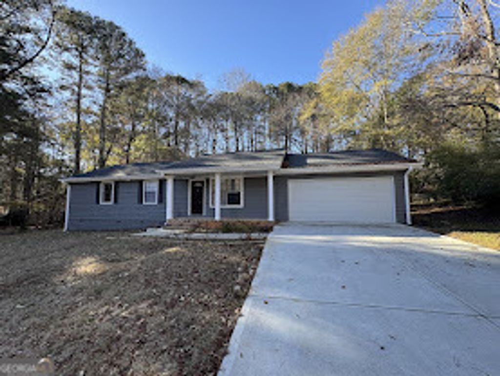 Photo of 65 Fair Oak Drive SE, Conyers, GA 30009 (MLS # 10658760)