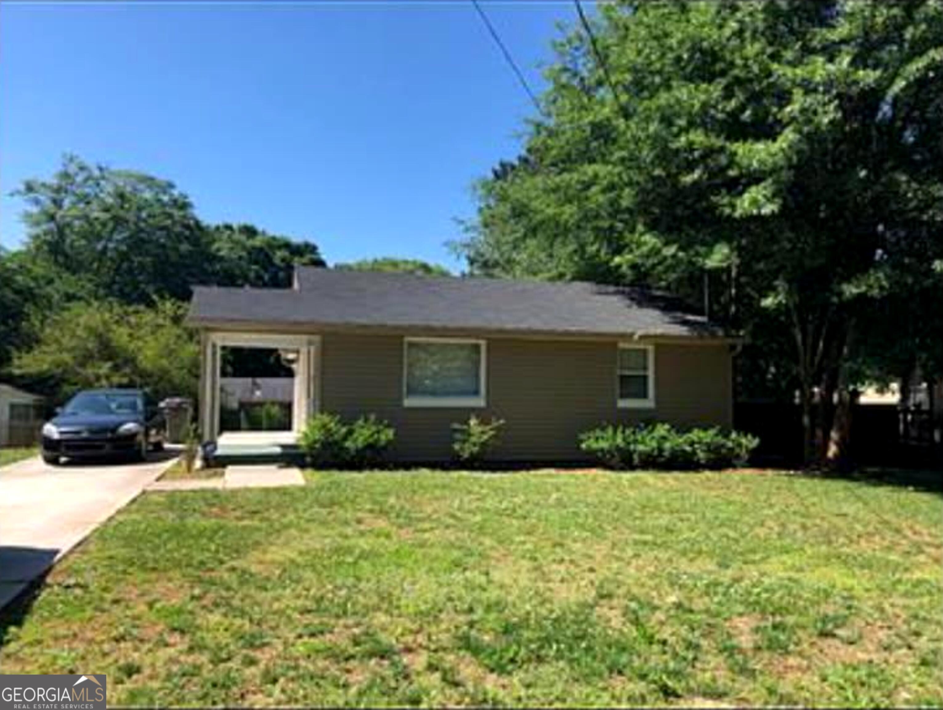 Discover the charm of the historic Collier Heights community, located just a few exits from downtown Atlanta. This home offers convenient access to I-20, I-285, and I-85, making commuting around the city simple and efficient. If you enjoy the excitement of city life, you'll appreciate being less than 7.5 miles from everything downtown Atlanta has to offer. Public transportation is easily accessible, with MARTA just a short walk away. Inside, the home is warm and inviting, featuring two well-sized bedrooms, an updated bathroom, and a cozy eat-in kitchen. This is a great opportunity to live close to the heart of Atlanta.