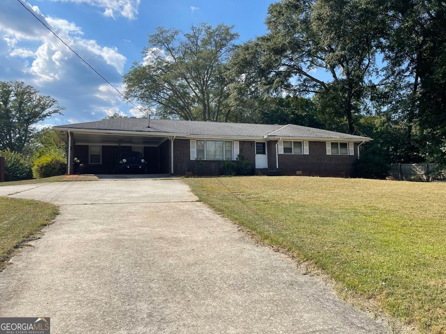 Calling all Investors!  All brick, ranch home offering 3 bedrooms, 1.5 baths. Full, unfinished basement. Large lot. Hardwood flooring on main. Great Dekalb schools, inside 285.