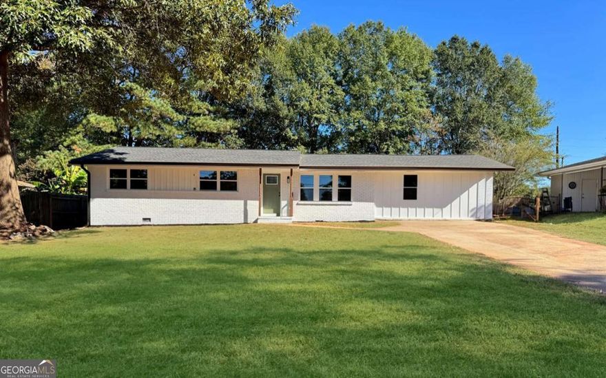 This fully renovated 4 sided brick ranch style home has everything you're looking for! With 4 bedrooms and 3 full baths, it features a split bedroom layout perfect for families or guests. Enjoy two primary suites, each with its own private bath, plus two more bedrooms and a guest bathroom. The open kitchen has a large island, quartz countertops, and stainless steel appliances-all overlooking the living room. LVP throughout and tiled bathrooms. You'll love the updates, including a new roof, HVAC, water heater, and top of the line, energy efficient, windows-giving you peace of mind for years to come. Step out back to a privacy fenced yard-great for entertaining, kids, or pets. All this just minutes from East Atlanta Village, the BeltLine, shopping, dining, and major highways. Modern updates, a great layout, and a prime location-this one checks all the boxes!