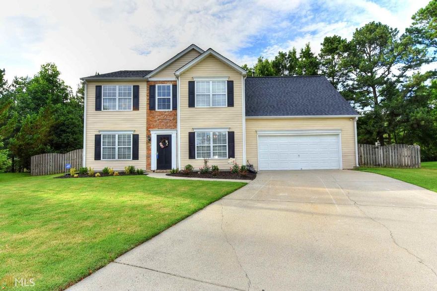 Welcome Home to this immaculately maintained, move-in ready home with upgrades throughout including new roof in 2017. Total kitchen remodel with all new cabinets, granite countertops, farmhouse sink, stainless appliances and more. Open concept with kitchen open to family room. Kid and dog friendly durable, moisture- proof flooring on main floor. Master retreat has renovated bathroom with oversized soaking tub. All-season sunroom opens to new deck in private, fenced backyard on a cul-de-sac lot. Location convenient to I-85, 316, and Mall of Georgia.