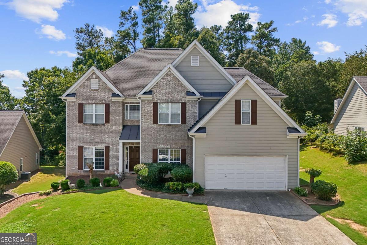 Welcome to this beautiful and well-maintained 4-bedroom, 3-bathroom home located in one of Suwanee's most desirable swim/tennis communities. Zoned for the highly acclaimed North Gwinnett High School, this home offers the ideal blend of space, comfort, and convenience-perfect for growing families. The main level features a guest bedroom and full bath, ideal for visitors, in-laws, or a home office. Enjoy an open-concept layout with a spacious living room, formal dining area, and a bright kitchen with ample cabinet space-perfect for entertaining or everyday living. Upstairs, you'll find a generously sized oversized master suite complete with a sitting area, large walk-in closet, and a private en-suite bath featuring dual vanities, soaking tub, and separate shower. Two additional secondary bedrooms and a full hall bath complete the upper level, offering plenty of space for family or guests. This home is situated just minutes from Suwanee Town Center, top-rated parks, greenways, and a wide selection of shopping and dining options. Easy access to major highways makes commuting a breeze. Neighborhood amenities include swim, tennis, playground. Don't miss this opportunity to own a beautiful home in a family-friendly community with access to award-winning schools and everything Suwanee has to offer!