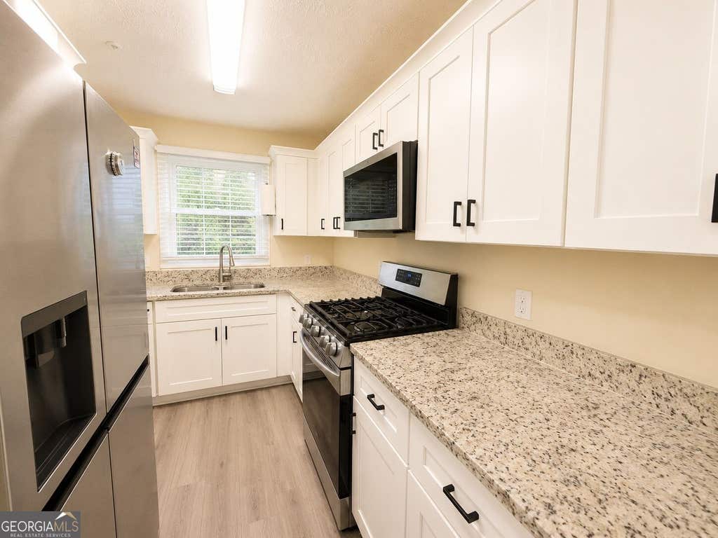 Photo of 2244 Wellington Circle, Lithonia, GA 30058 (MLS # 10829112)