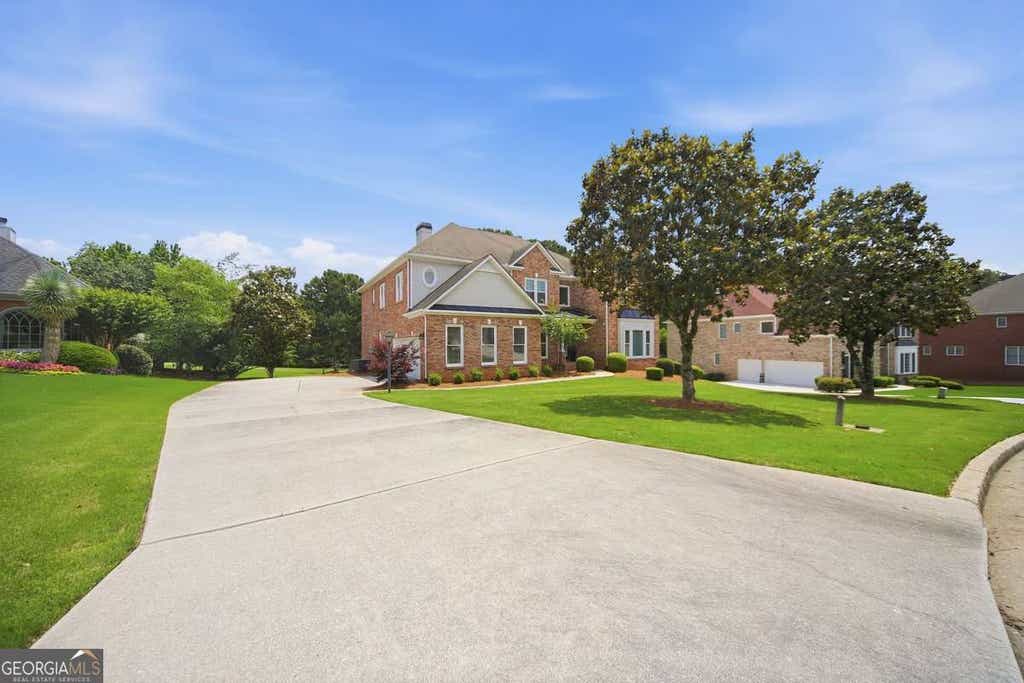 Photo of 705 Masters Drive, Stone Mountain, GA 30087 (MLS # 10777287)