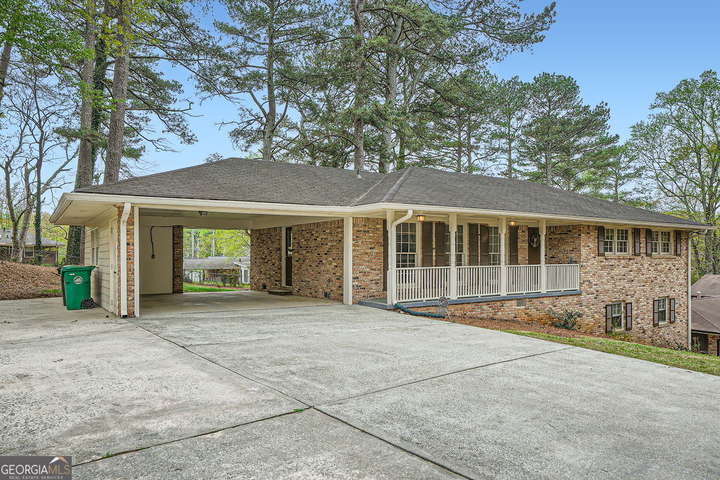 This classic all brick ranch was totally renovated in 2014 and meticulously maintained by the owners. Located in Sharon Park subdivision within a mile of Livsey Elementary and convenient to the thriving downtown Tucker with new restaurants and of course the classic Matthews Cafeteria . Granite countertops in the kitchen with beautiful stained cabinets. Stainless refrigerator, drop in range and microwave. The original hardwood floors have been beautifully maintained. The carpeted basement room is ideal for a game room, party room or exercise room. Ring cameras at the entrances. A brand new garden shed was just installed. This neighborhood is a delight with well maintained homes ready to welcome you and your family.