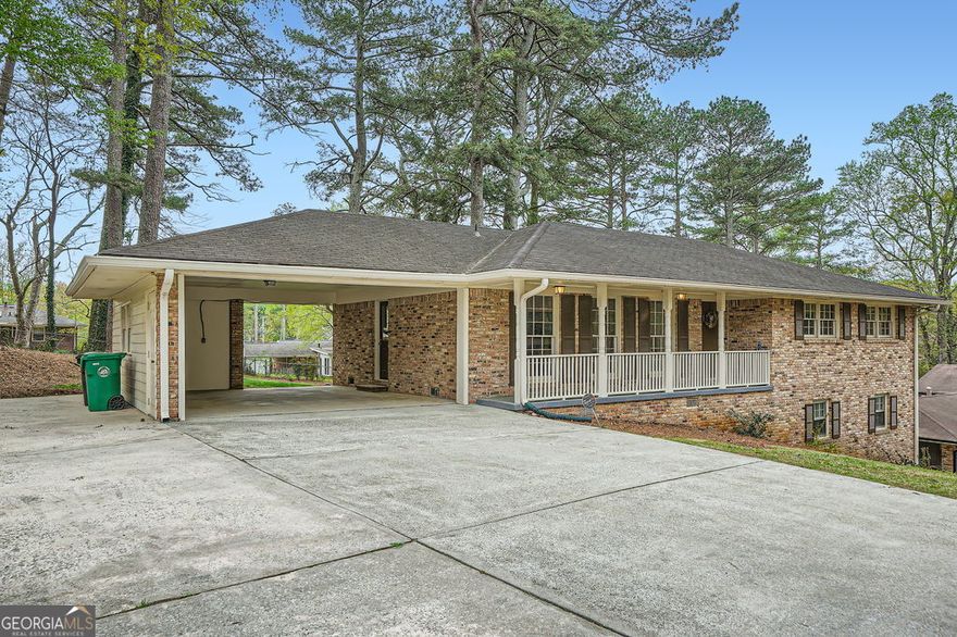 This classic all brick ranch was totally renovated in 2014 and meticulously maintained by the owners. Located in Sharon Park subdivision within a mile of Livsey Elementary and convenient to the thriving downtown Tucker with new restaurants and of course the classic Matthews Cafeteria . Granite countertops in the kitchen with beautiful stained cabinets. Stainless refrigerator, drop in range and microwave. The original hardwood floors have been beautifully maintained. The carpeted basement room is ideal for a game room, party room or exercise room. Ring cameras at the entrances. A brand new garden shed was just installed.  This neighborhood is a delight with well maintained homes ready to welcome you and your family.