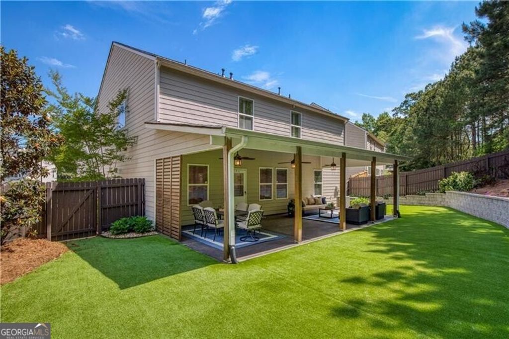 Photo of 6728 Pierless Avenue, Buford, GA 30518 (MLS # 10770409)