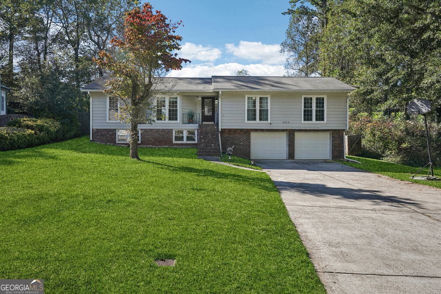 Welcome home to your newly remodeled brick ranch in the heart of East Cobb with a partially finished basement and completely renovated kitchen and bathrooms with NO HOA! This beautiful home is situated on a large, private, fenced yard. Windows are brand new. This ranch remodel invites you into a modern and open great room that includes a living room, dining room, breakfast room, and all white kitchen with plenty of natural light. The kitchen features stainless steel appliances, white cabinetry, free-standing stainless steel range hood, and overlooks the living area. The dining room features modern new lighting fixtures and a low-profile gas fireplace. New luxury vinyl plank flooring throughout most of the main floor. The three bedrooms and two renovated bathrooms complete the main floor with Bluetooth speakers, you can connect to your phone or listening to music while you taking bath. The lower level provides an additional 500 sq ft of finished space and the opportunity to entertain in your game room or privacy for your office.  The driveway and garage doors are only a few years old. The spacious, level and fenced backyard is waiting for you to entertain guests or to just relax. Investor friendly. Close to top rated schools. Convenient to Roswell and Marietta. Minutes to I-75, I-575. Shopping, restaurants and KSU.