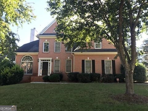**PRICE IMPROVEMENT** An executive style, 4-sided brick 5BD, 3BA home on spacious 1 acre lot. This spacious home has a sunlit living area with floor to ceiling windows. All bedrooms are spacious and have large closets. Kitchen has granite counters. Full, unfinished basement for lots of storage. Located on a 1-acre lot with large deck and patio overlooking a private backyard.