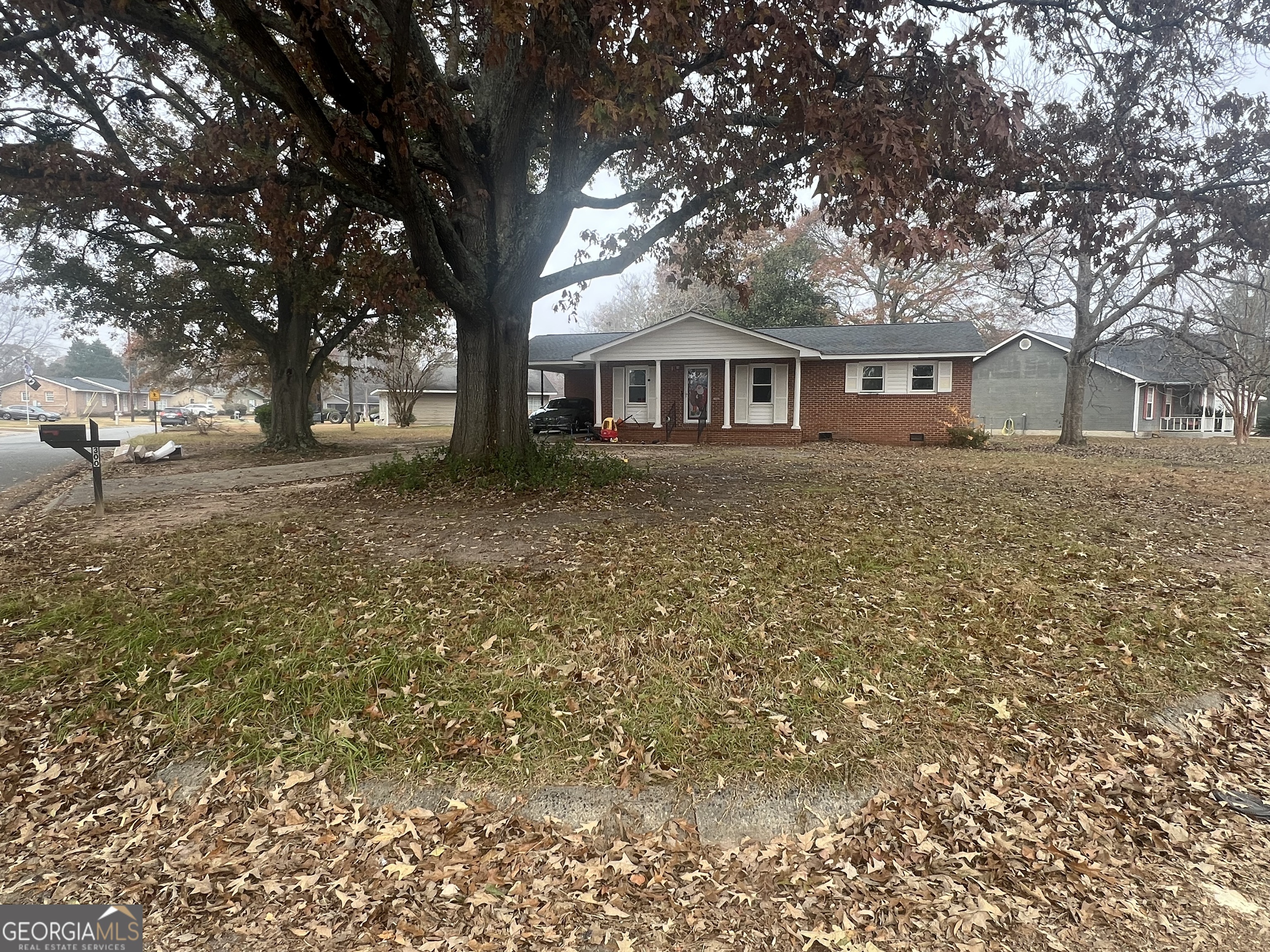 4 sided brick ranch style home, on a large corner lot. Back yard is fenced with a storage shed. Homes boasts 3 dedicated bedrooms with a half bath in the owner's suite. A full bath is in the main hallway, with a shower and large tub combination.